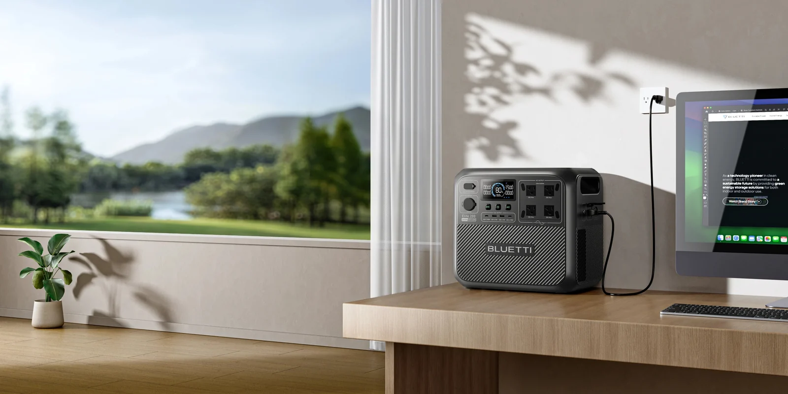 BLUETTI Elite 200 V2 in a manufacturer home-office scene beside a window